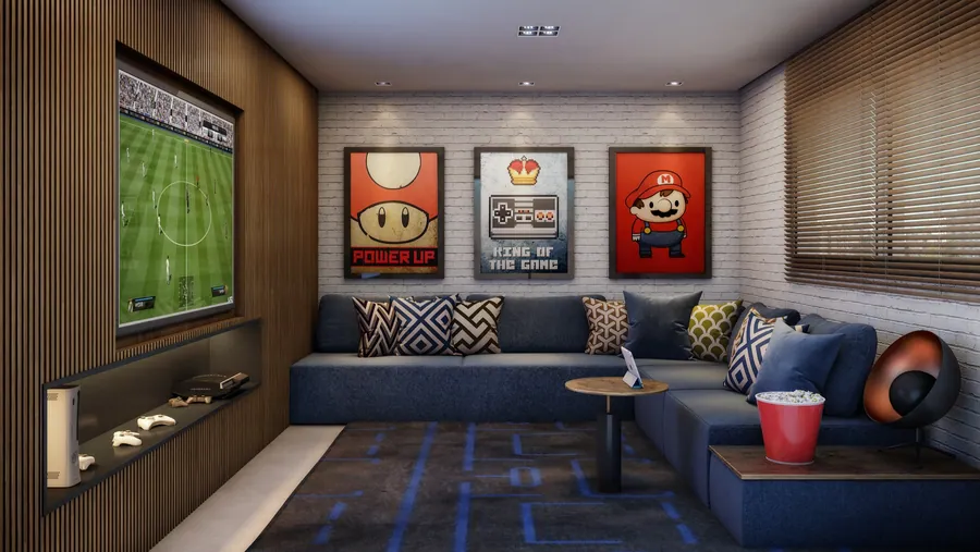 Sala de games com sofás e telão